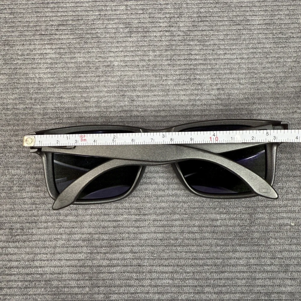 Oakley Black Frame Sunglasses with Purple-Red Mirrored Lenses